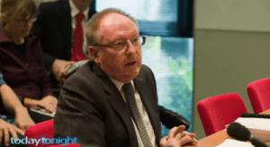 steven-cooper-giving-evidence-e1428802460915